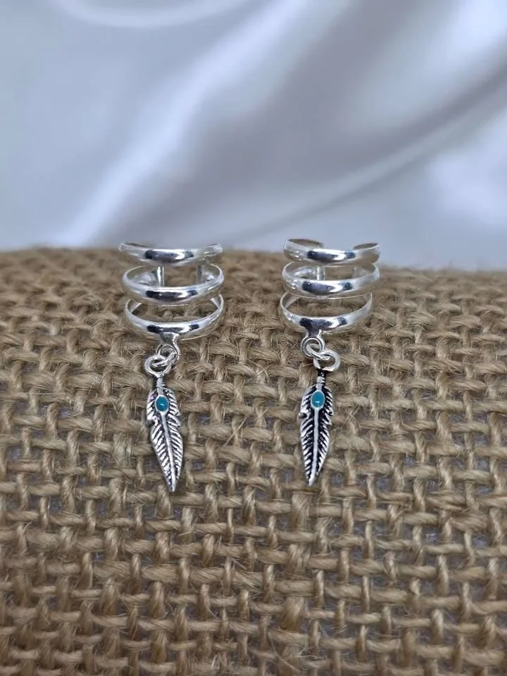 Piercing 3 aros com pena 