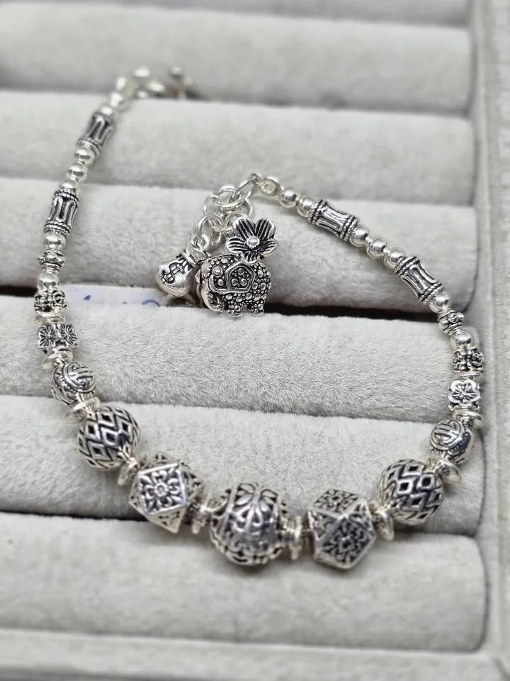 Pulseira balinesa de esferas vazadas 